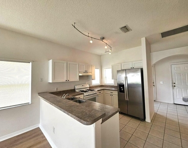 7625 Clovelly Park Place - Photo Thumbnail 4