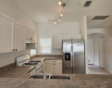 7625 Clovelly Park Place - Photo Thumbnail 3