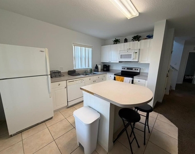 2714 Club Cortile Circle - Photo Thumbnail 1