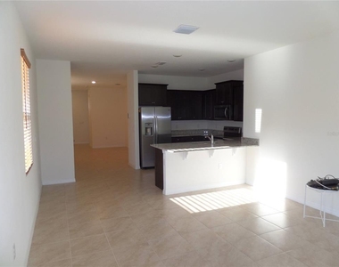 8051 Penrose Place - Photo Thumbnail 12