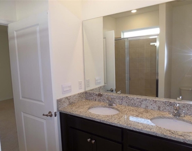 8051 Penrose Place - Photo Thumbnail 18