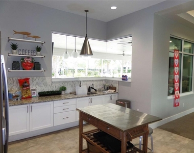 8051 Penrose Place - Photo Thumbnail 63