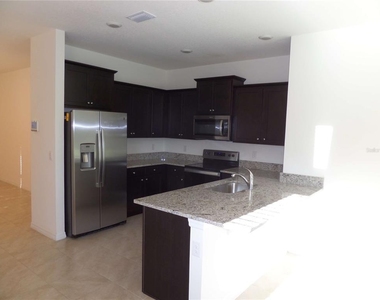 8051 Penrose Place - Photo Thumbnail 6
