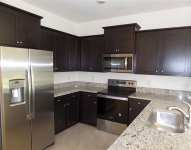 8051 Penrose Place - Photo Thumbnail 7