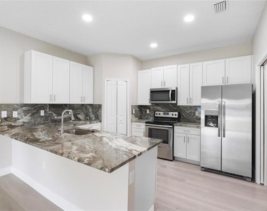 1201 W 9th Street - Photo Thumbnail 2