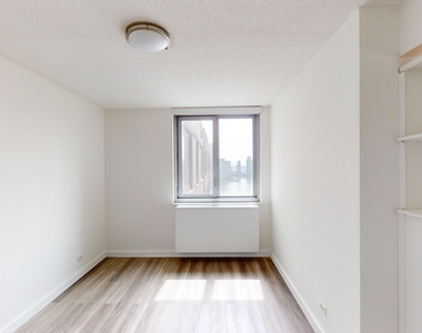 401 E 34th St - Photo Thumbnail 4