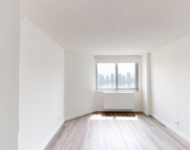 401 E 34th St - Photo Thumbnail 3