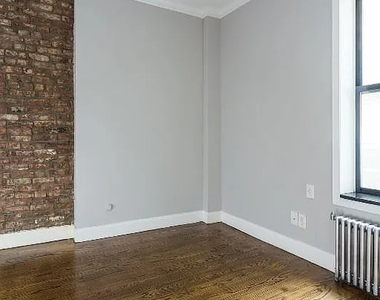 334 East 100th Street - Photo Thumbnail 3