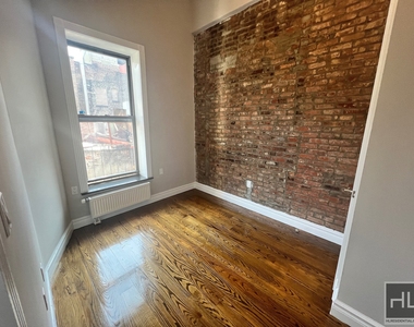 E 13th St. - Photo Thumbnail 1