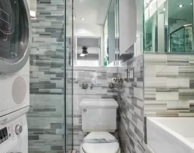 W 53rd St. - Photo Thumbnail 5