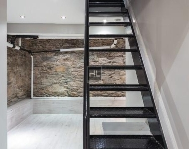 W 53rd St. - Photo Thumbnail 3