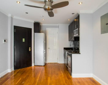 W 53rd St. - Photo Thumbnail 2