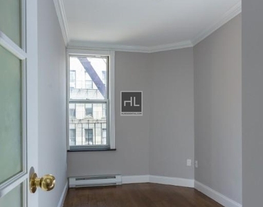 W 53rd St. - Photo Thumbnail 4