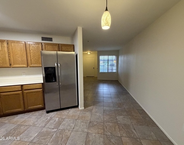 8625 E Belleview Place - Photo Thumbnail 5