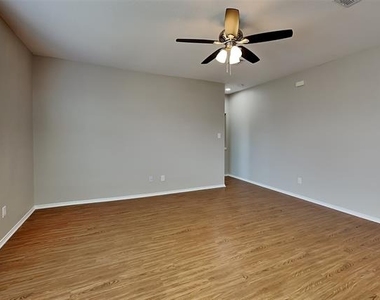 7908 Swan Park Drive - Photo Thumbnail 3