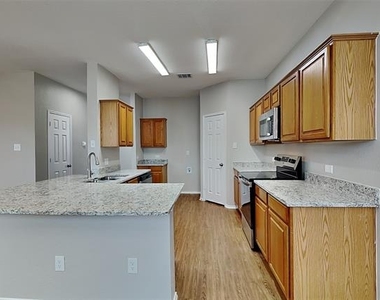 7908 Swan Park Drive - Photo Thumbnail 5