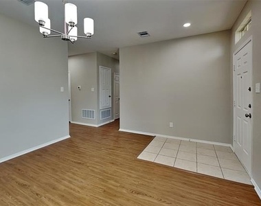 7908 Swan Park Drive - Photo Thumbnail 1