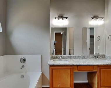 7908 Swan Park Drive - Photo Thumbnail 9