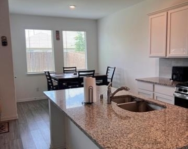 1520 Avery Pointe Drive - Photo Thumbnail 2