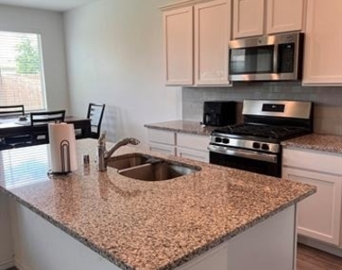1520 Avery Pointe Drive - Photo Thumbnail 3