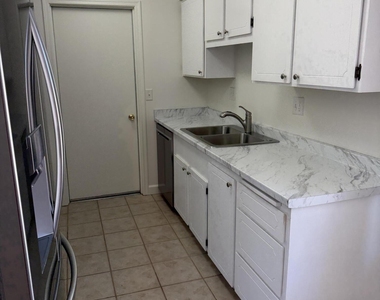 10833 W Santa Fe Drive - Photo Thumbnail 6