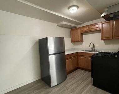 2424 E 24th Street - Photo Thumbnail 3