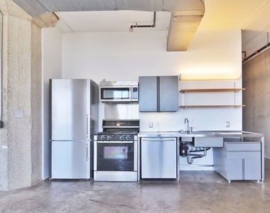 315 E 8th Street - Photo Thumbnail 8
