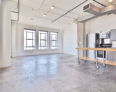 315 E 8th Street - Photo Thumbnail 2