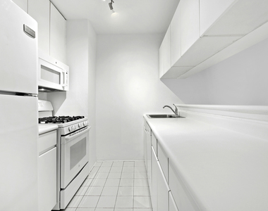 235 E 40th St - Photo Thumbnail 3