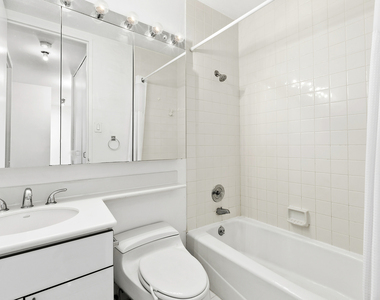 235 E 40th St - Photo Thumbnail 6