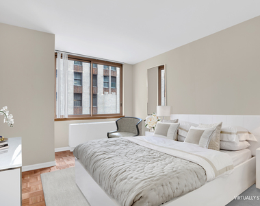 235 E 40th St - Photo Thumbnail 4
