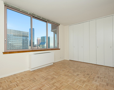 235 E 40th St - Photo Thumbnail 6