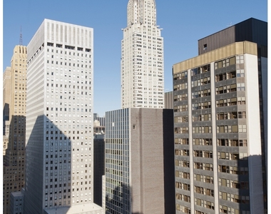 235 E 40th St - Photo Thumbnail 4
