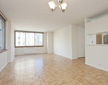 235 E 40th St - Photo Thumbnail 2