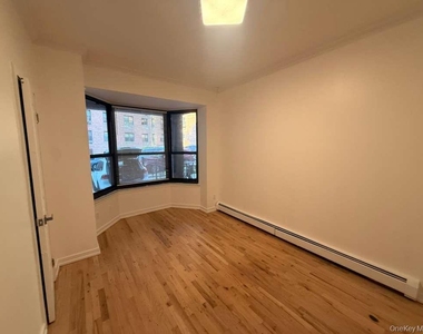 102-39 66th Avenue - Photo Thumbnail 4