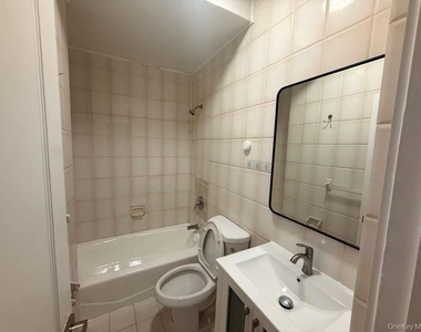 102-39 66th Avenue - Photo Thumbnail 3