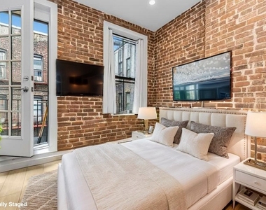 356 W 48th Street - Photo Thumbnail 3
