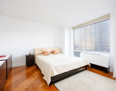 401 E 60th Street - Photo Thumbnail 4