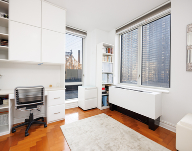 401 E 60th Street - Photo Thumbnail 2