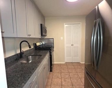7320 Donnell Place - Photo Thumbnail 4