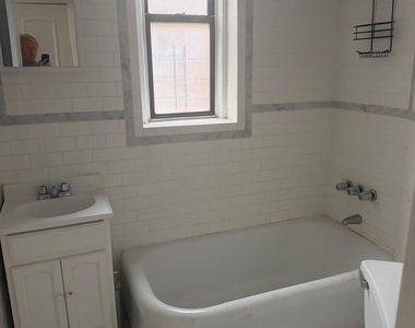 West 213th Street - Photo Thumbnail 2