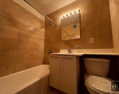 East 49 Street - Photo Thumbnail 2