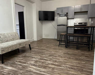 1134 Hancock St - Photo Thumbnail 2