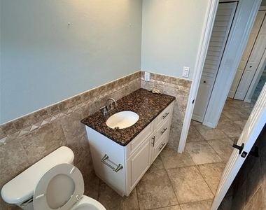 9393 Midnight Pass Road - Photo Thumbnail 27