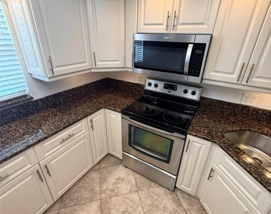 9393 Midnight Pass Road - Photo Thumbnail 8