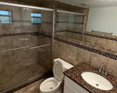 9393 Midnight Pass Road - Photo Thumbnail 18