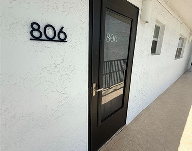 9393 Midnight Pass Road - Photo Thumbnail 1