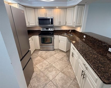 9393 Midnight Pass Road - Photo Thumbnail 7