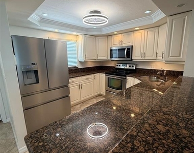 9393 Midnight Pass Road - Photo Thumbnail 6