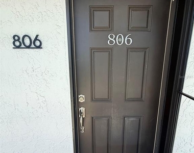 9393 Midnight Pass Road - Photo Thumbnail 2